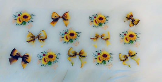 Sunflowers and yellow bows
